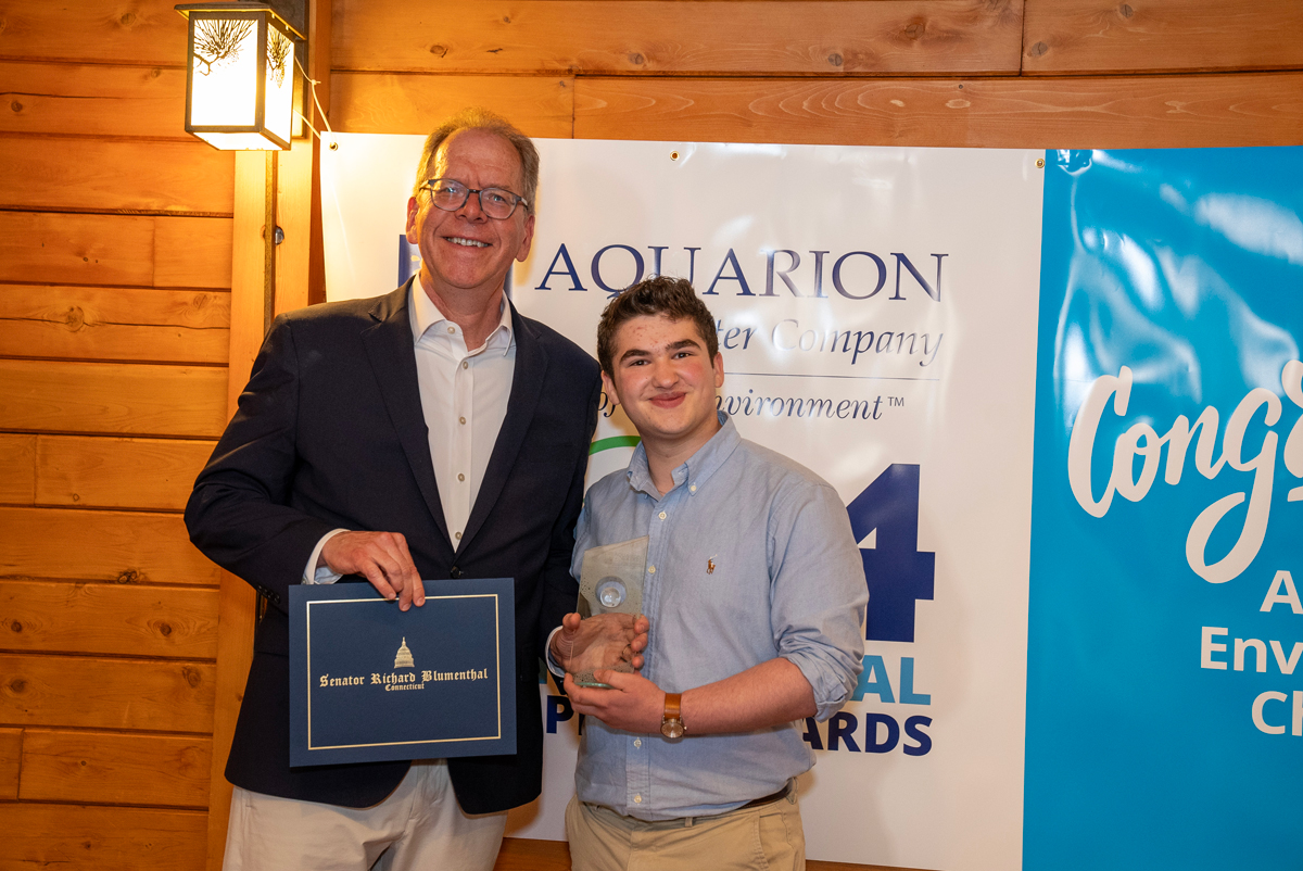 Aquarion Water Company President Don Morrissey with student winner Nathaniel Goldschmidt